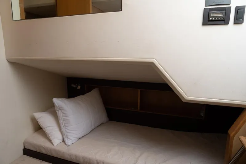  Yacht Photos Pics Cozy cabin bed in 2012 Princess V72 yacht interior.