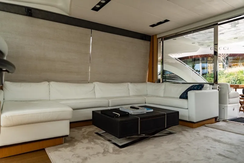  Yacht Photos Pics Luxurious interior of 2012 Princess V72 yacht with white leather sofa and modern decor.