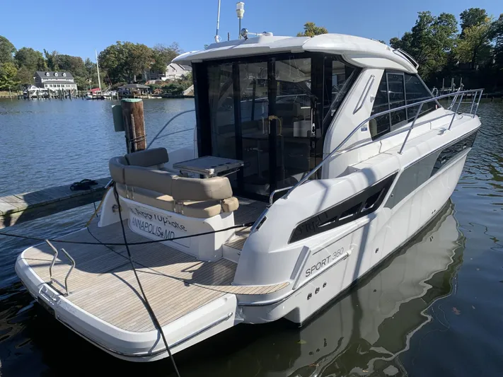  Yacht Photos Pics 2015 Bavaria S36 Coupe yacht docked on a calm lake.
