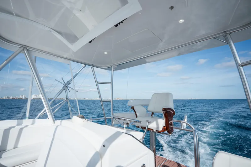 Reelin N Dealin Yacht Photos Pics 2018 Viking 37 Billfish yacht interior with ocean view and seating.