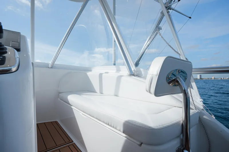 Reelin N Dealin Yacht Photos Pics 2018 Viking 37 Billfish boat interior with white seating and ocean view.