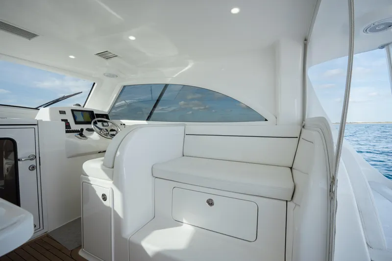 Reelin N Dealin Yacht Photos Pics Interior of 2018 Viking 37 Billfish yacht with modern helm and seating.