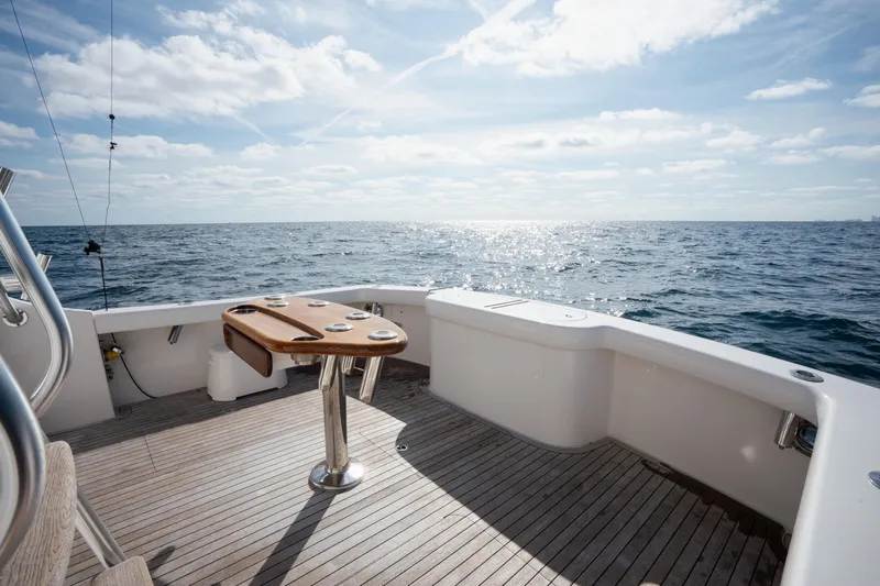 Reelin N Dealin Yacht Photos Pics 2018 Viking 37 Billfish yacht deck with ocean view and clear sky.