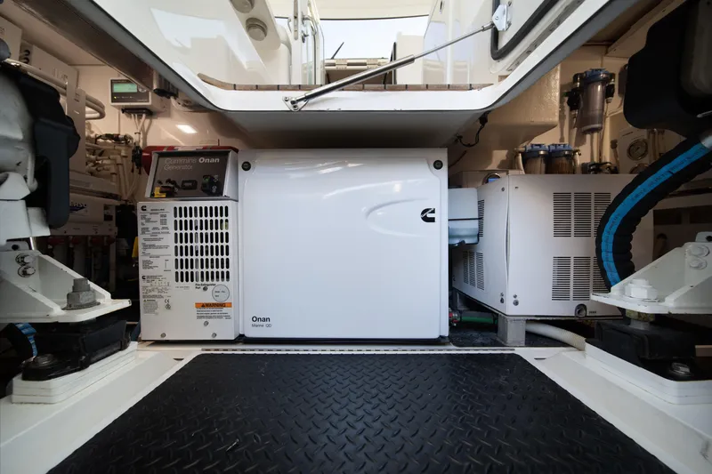 Reelin N Dealin Yacht Photos Pics Engine room of 2018 Viking 37 Billfish with Cummins Onan generator.