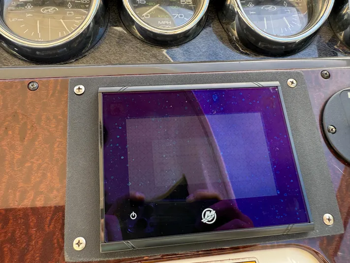 Rollin With The Flow Yacht Photos Pics Dashboard of 2012 Sea Ray 310 Sundancer with gauges and touchscreen display.