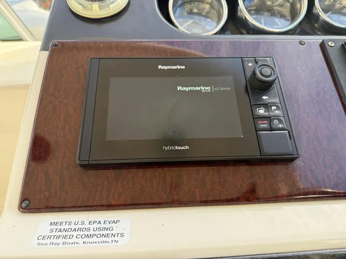 Rollin With The Flow Yacht Photos Pics Raymarine navigation system on 2012 Sea Ray 310 Sundancer boat dashboard.