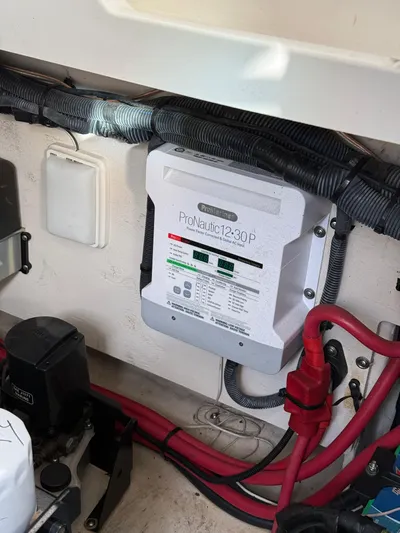 Rollin With The Flow Yacht Photos Pics 2012 Sea Ray 310 Sundancer engine compartment with ProMariner ProNautic charger.