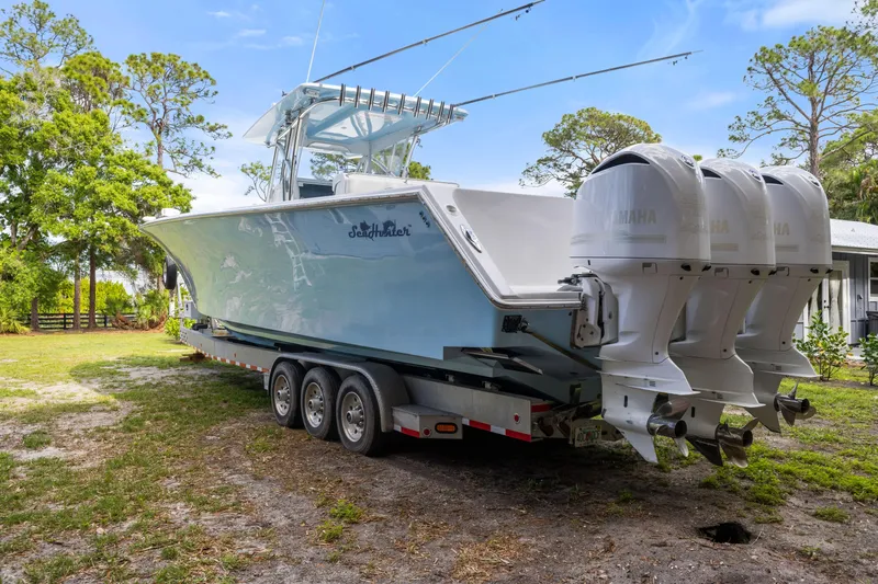 Yacht Photos Pics 2016 SeaHunter 41 Tournament boat with triple Yamaha engines on a trailer.