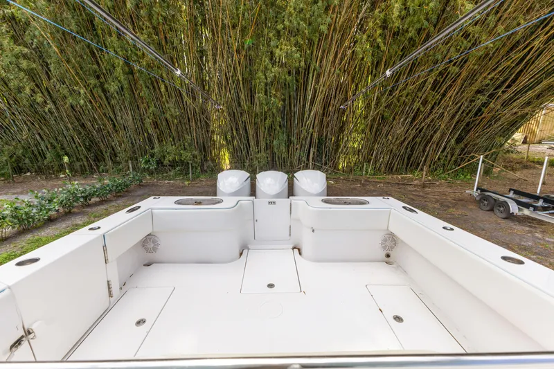  Yacht Photos Pics 2016 SeaHunter 41 Tournament boat deck with lush bamboo backdrop.