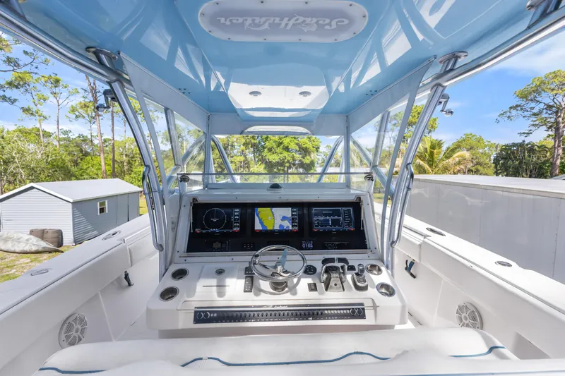  Yacht Photos Pics 2016 SeaHunter 41 Tournament boat cockpit with advanced navigation system and sleek design.