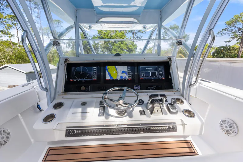  Yacht Photos Pics 2016 SeaHunter 41 Tournament boat helm with advanced navigation displays and controls.