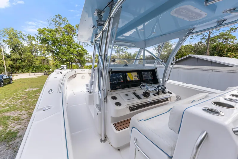  Yacht Photos Pics 2016 SeaHunter 41 Tournament boat cockpit with modern navigation system and sleek design.
