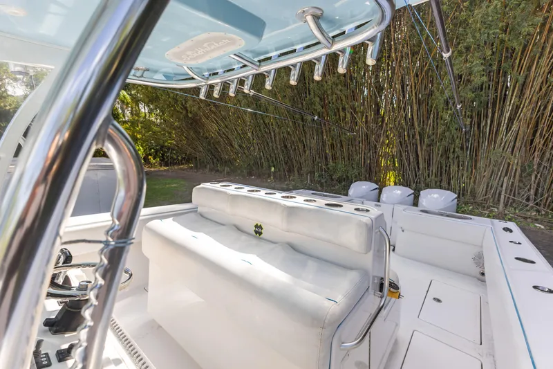  Yacht Photos Pics 2016 SeaHunter 41 Tournament boat interior with seating and fishing rod holders.