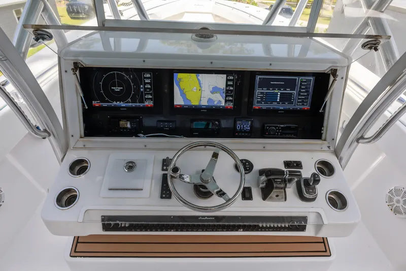  Yacht Photos Pics 2016 SeaHunter 41 Tournament helm with advanced navigation displays and controls.