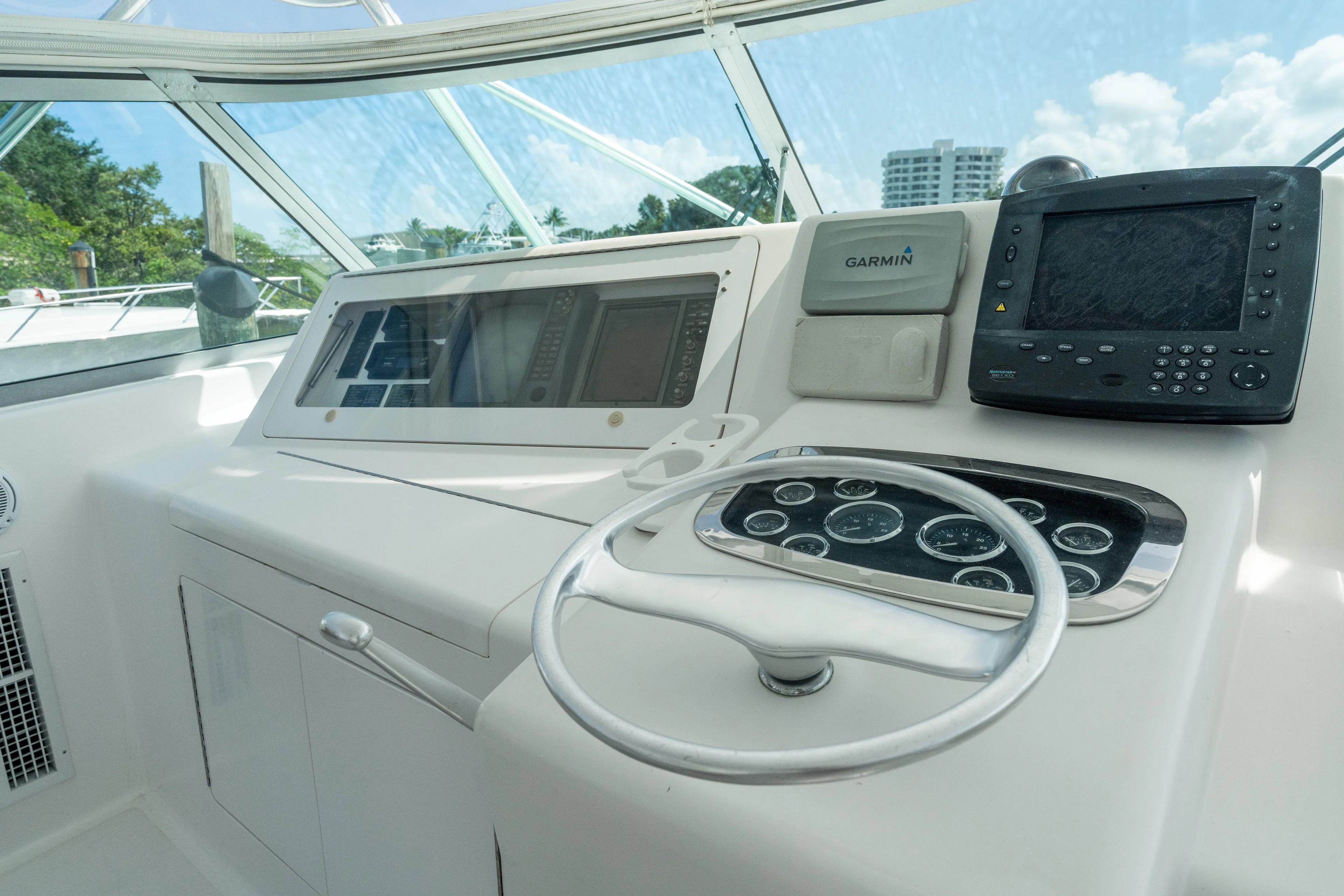 All Keyed Up Yacht Photos Pics Helm of 2001 Viking 50 Express yacht with Garmin navigation system.