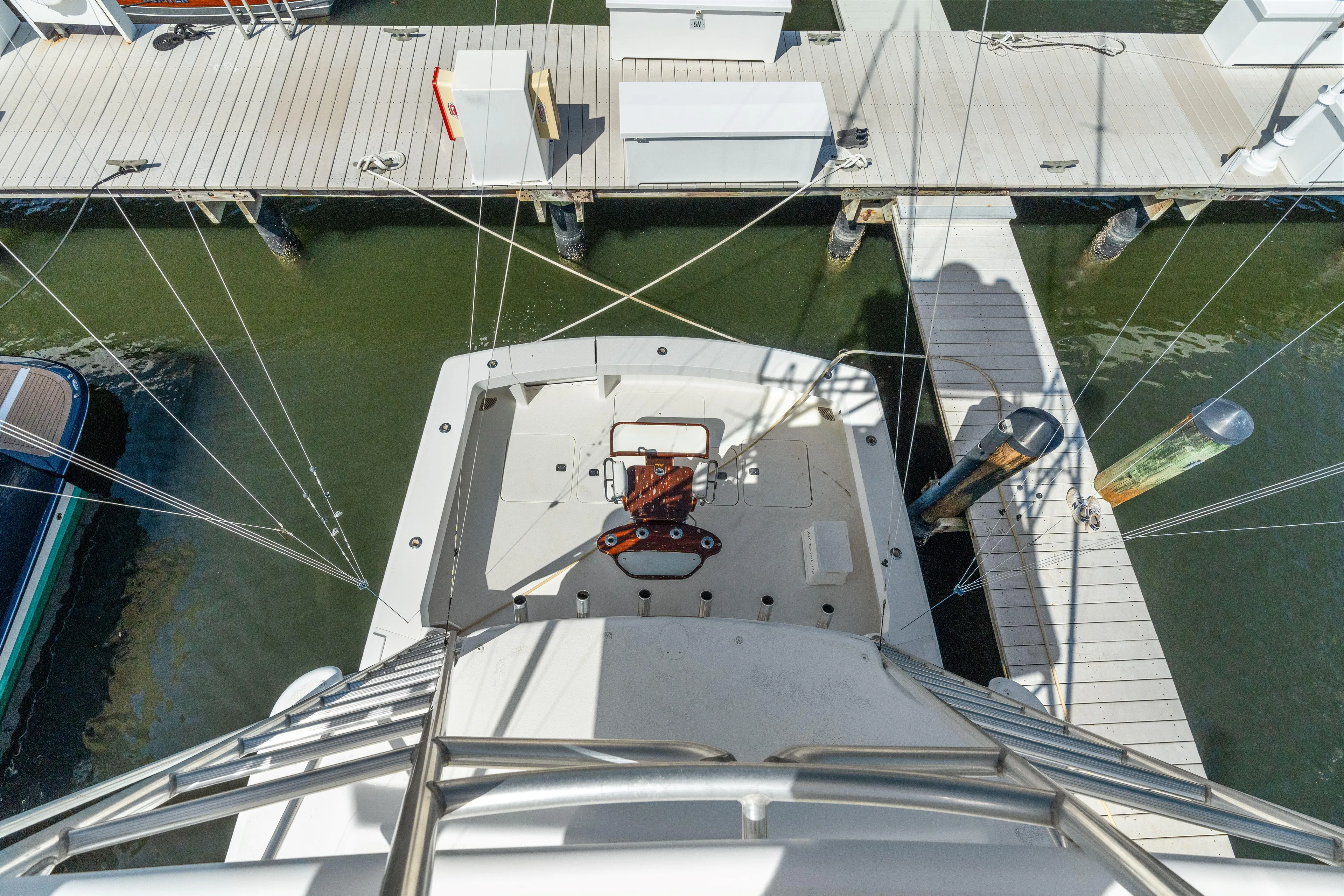 All Keyed Up Yacht Photos Pics Overhead view of 2001 Viking 50 Express yacht docked at marina.
