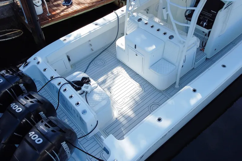  Yacht Photos Pics 2008 Yellowfin 42 Offshore boat with triple Mercury 400 engines, spacious deck layout.