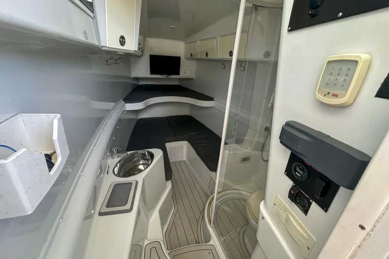  Yacht Photos Pics 2008 Yellowfin 42 Offshore cabin interior with modern amenities and sleek design.