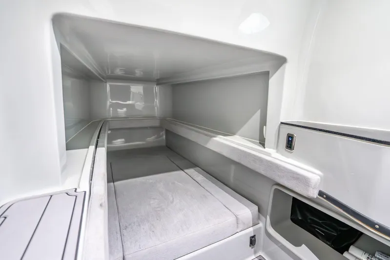 Four Reels Yacht Photos Pics 2021 Contender 44 CB cabin interior with sleek, modern design and comfortable seating.