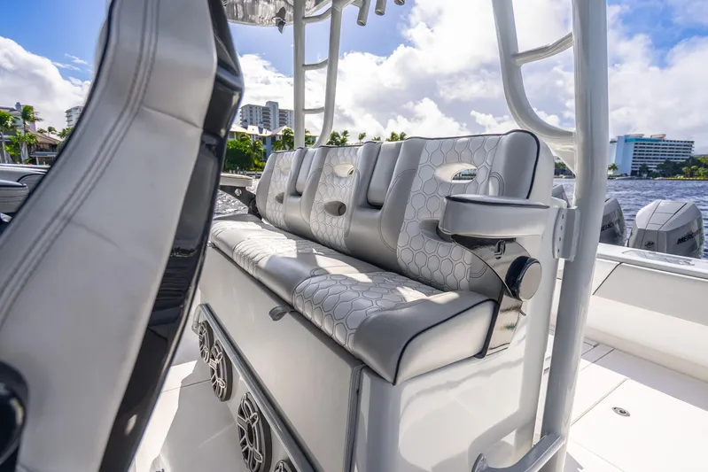 Four Reels Yacht Photos Pics 2021 Contender 44 CB boat interior with luxurious seating and modern design.