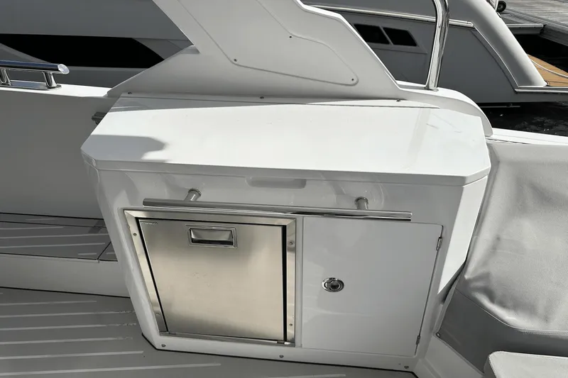 Cinza Yacht Photos Pics 2020 Azimut 40 Verve yacht interior with sleek white cabinetry and stainless steel accents.