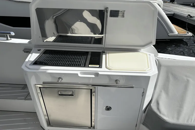 Cinza Yacht Photos Pics Outdoor kitchen on 2020 Azimut 40 Verve yacht with grill and cutting board.