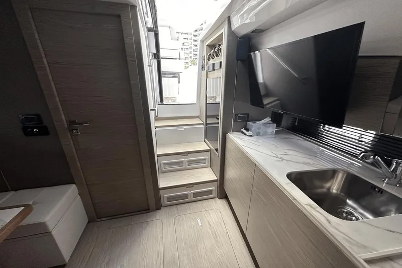 Cinza Yacht Photos Pics Interior of 2020 Azimut 40 Verve yacht with modern kitchen and sleek design.