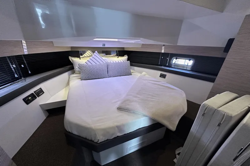Cinza Yacht Photos Pics Luxurious cabin interior of 2020 Azimut 40 Verve yacht with modern bedding.