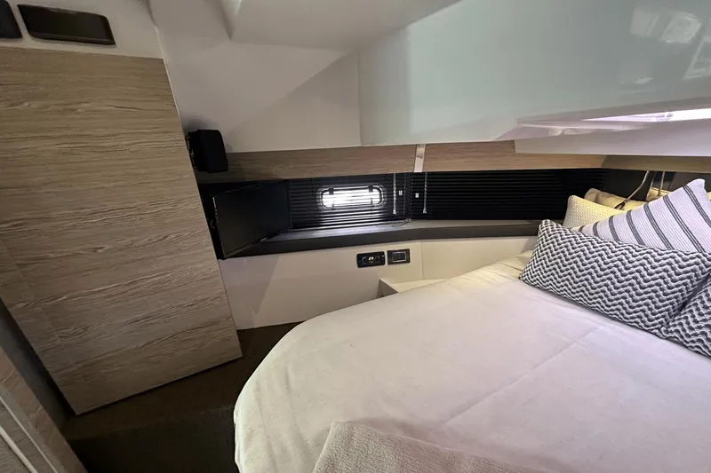 Cinza Yacht Photos Pics Luxurious cabin interior of 2020 Azimut 40 Verve yacht with modern design and cozy bedding.