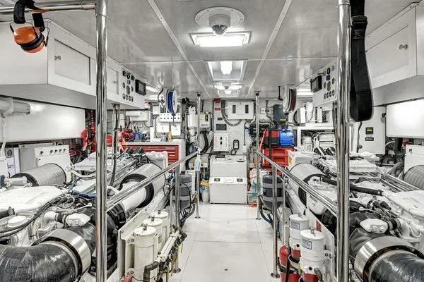 Danielle Yacht Photos Pics Engine room of 2005 Hatteras 100 Motor Yacht, showcasing advanced machinery and equipment.