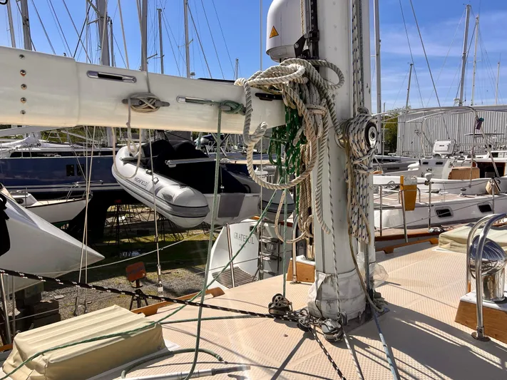 Glory Yacht Photos Pics Sailboat deck with rigging, ropes, and docked boats; Shannon 43 Cutter, 2001 model.