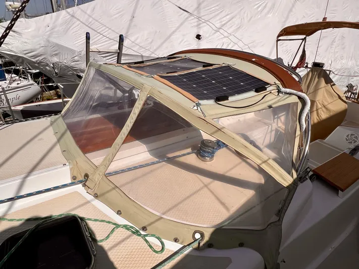 Glory Yacht Photos Pics 2001 Shannon 43 Cutter sailboat with solar panel on deck, docked in marina.