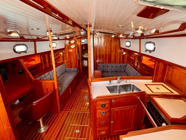 Glory Yacht Photos Pics Luxurious 2001 Shannon 43 Cutter yacht interior with wood finish and modern amenities.