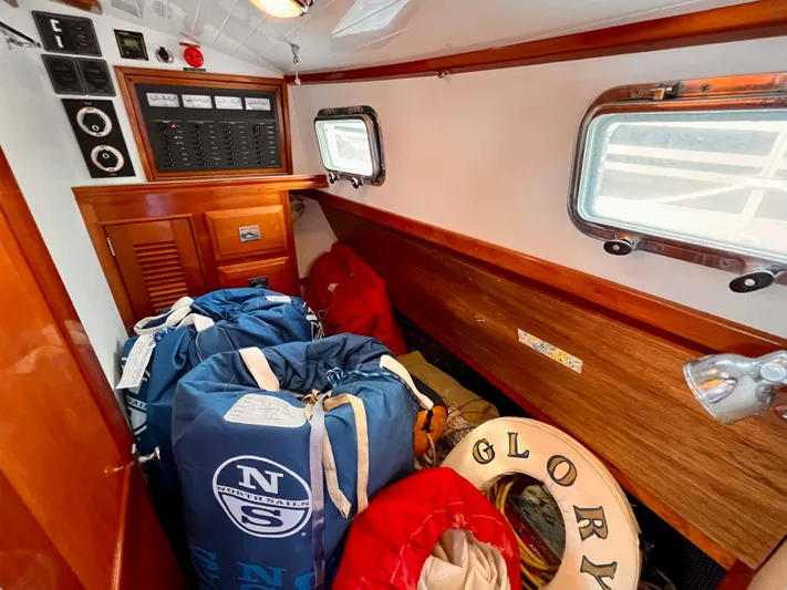 Glory Yacht Photos Pics Interior of 2001 Shannon 43 Cutter sailboat with storage bags and life preserver.