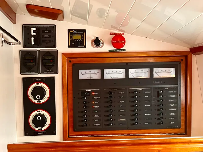 Glory Yacht Photos Pics Electrical control panel on a 2001 Shannon 43 Cutter sailboat, featuring gauges and switches.