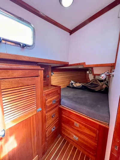 Glory Yacht Photos Pics 2001 Shannon 43 Cutter cabin with wooden interior and storage drawers.