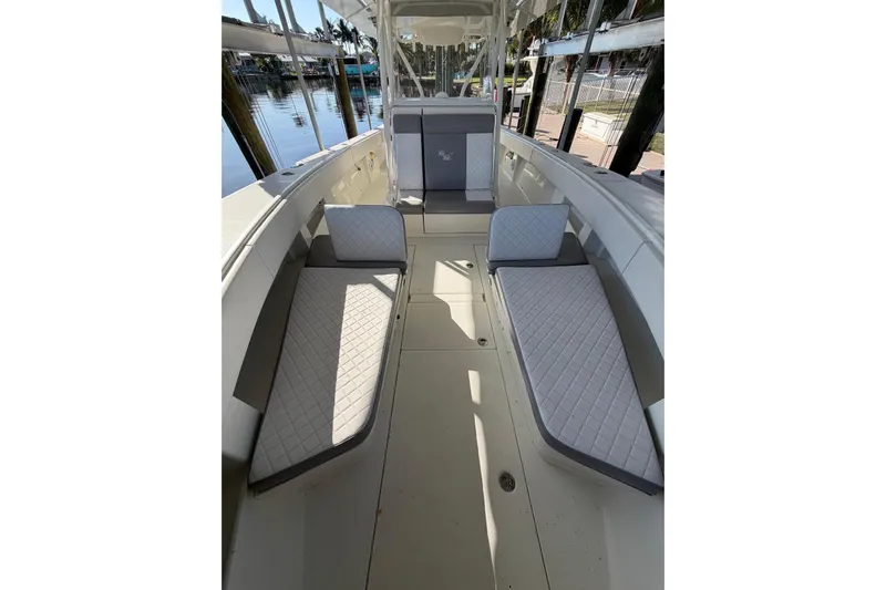  Yacht Photos Pics 2018 SeaVee 390Z boat interior with cushioned seating and sleek design.