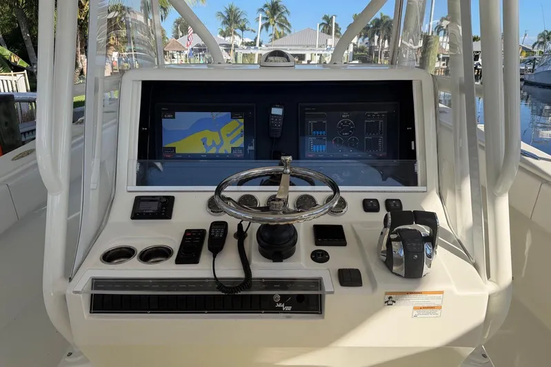  Yacht Photos Pics 2018 SeaVee 390Z boat dashboard with navigation screens and controls.