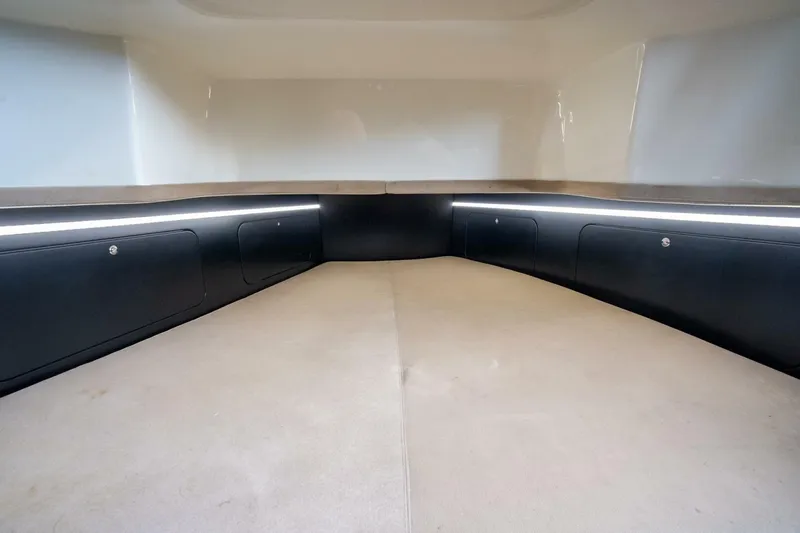  Yacht Photos Pics Interior cabin of 2023 Skipper-BSK 42 boat, featuring sleek design and ambient lighting.