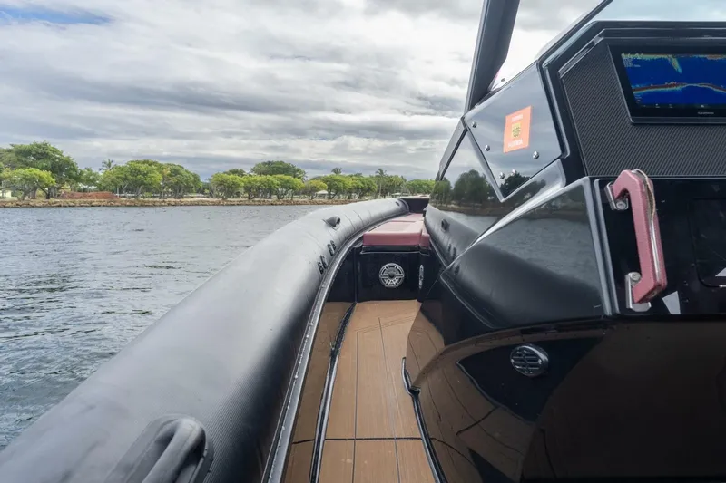  Yacht Photos Pics 2023 Skipper-BSK 42 boat on water, featuring sleek design and advanced navigation system.