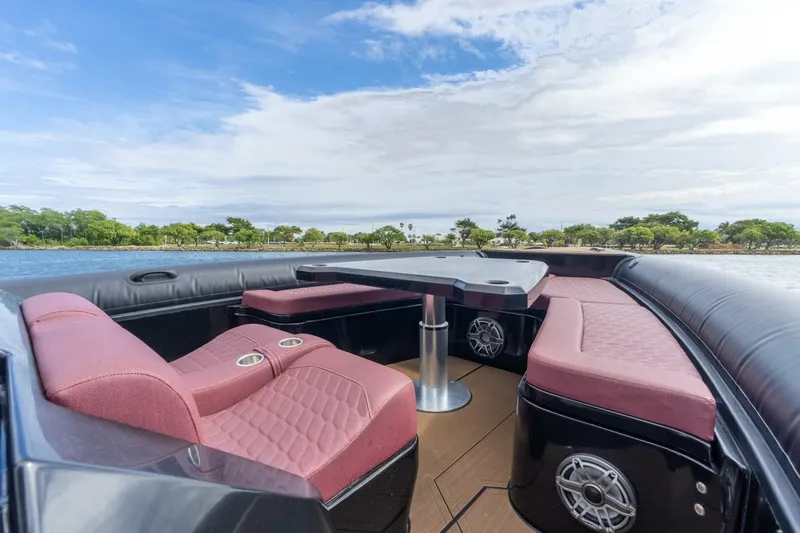  Yacht Photos Pics Luxurious 2023 Skipper-BSK 42 boat interior with plush seating and scenic water view.