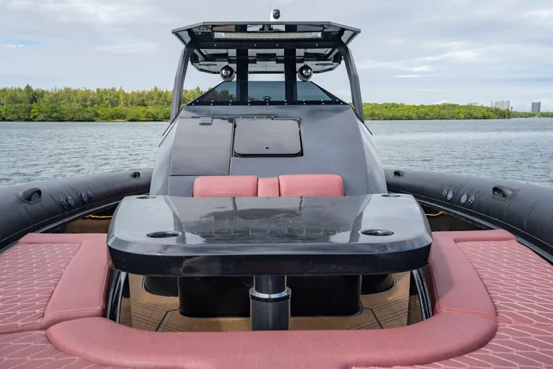  Yacht Photos Pics Luxury Skipper-BSK 42 boat interior with sleek design, 2023 model, on calm waters.