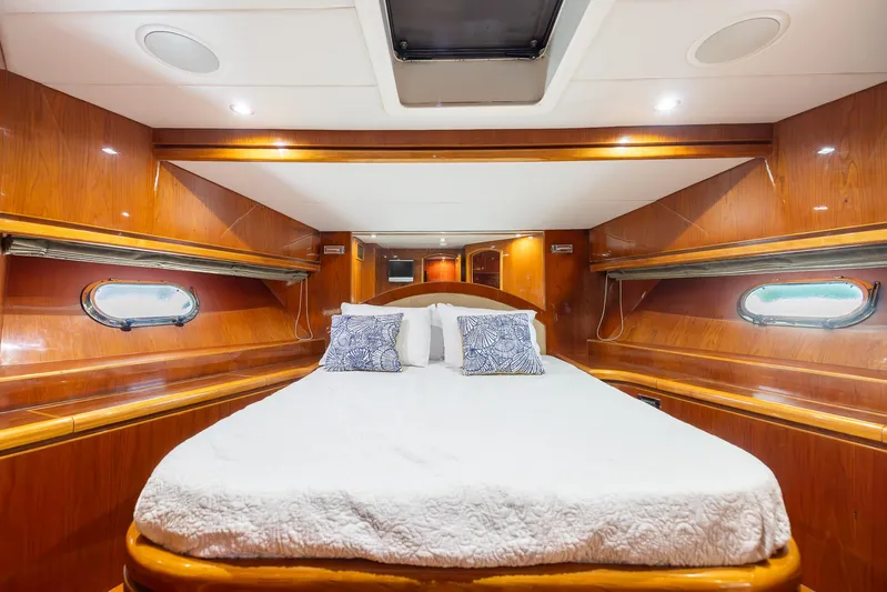 Ocean 1 Yacht Photos Pics Luxurious cabin interior of 2008 Hargrave Sky Lounge yacht with elegant wood finish.