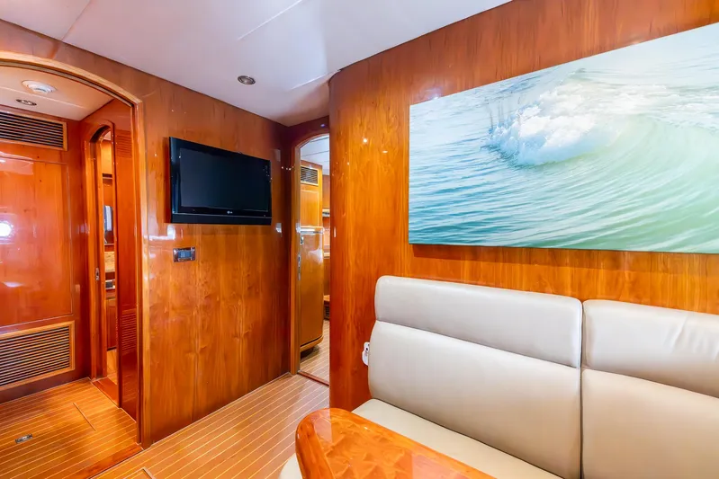 Ocean 1 Yacht Photos Pics Luxurious 2008 Hargrave Sky Lounge interior with wood paneling and modern amenities.