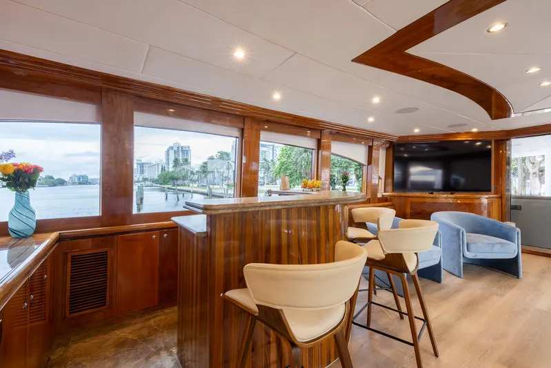Ocean 1 Yacht Photos Pics Luxurious 2008 Hargrave Sky Lounge interior with elegant wood finishes and modern seating.