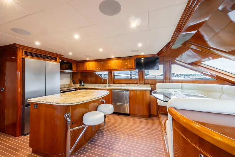 Ocean 1 Yacht Photos Pics Luxurious 2008 Hargrave Sky Lounge yacht interior with modern kitchen and seating area.