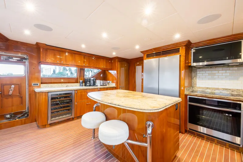 Ocean 1 Yacht Photos Pics Luxurious kitchen in 2008 Hargrave Sky Lounge yacht with modern appliances and wood finishes.