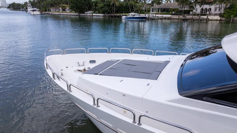 Ocean 1 Yacht Photos Pics 2008 Hargrave Sky Lounge yacht on serene waterway, featuring sleek design and spacious deck.