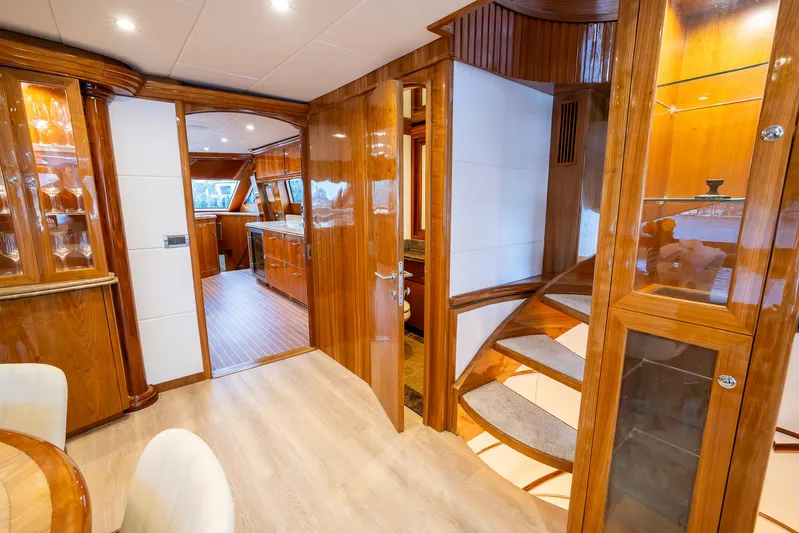 Ocean 1 Yacht Photos Pics Luxurious interior of 2008 Hargrave Sky Lounge yacht with elegant wood finishes and modern design.