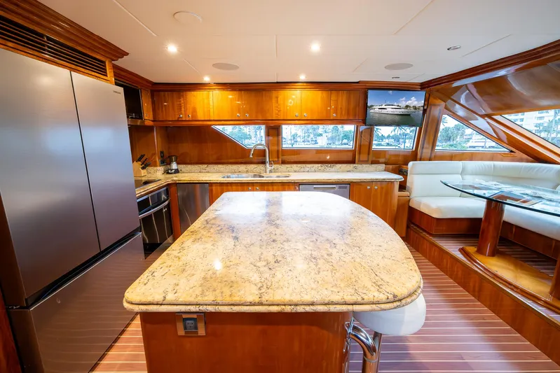 Ocean 1 Yacht Photos Pics Luxurious 2008 Hargrave Sky Lounge yacht kitchen with granite countertops and modern appliances.
